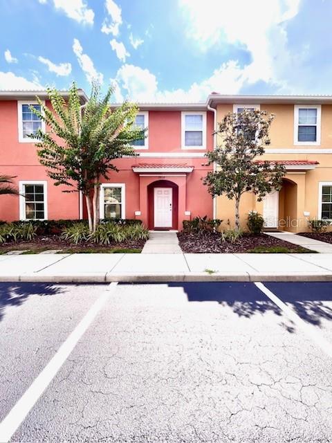 3014 Red Ginger Rd, Kissimmee, FL 34747 - multi unit property with stucco siding and uncovered parking