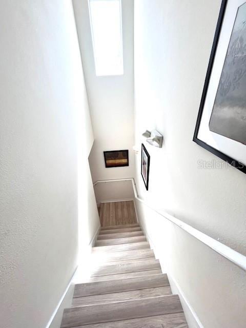 3014 Red Ginger Rd, Kissimmee, FL 34747 - stairs with wood finished floors