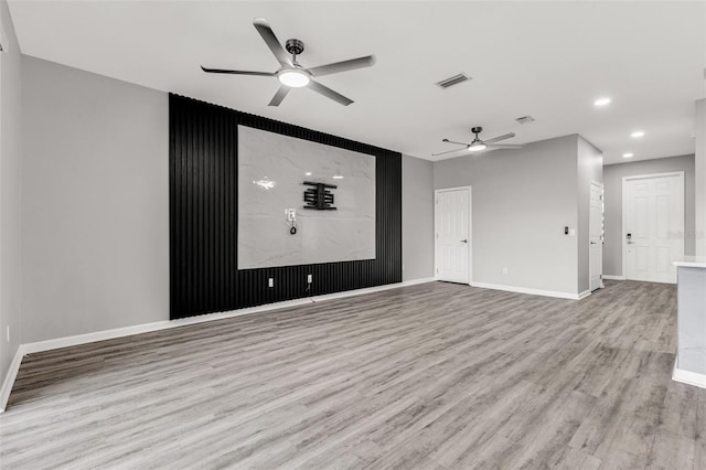 1628 Portofino Meadows Blvd, Orlando, FL 32824 - empty room with a ceiling fan, wood finished floors, baseboards, and recessed lighting