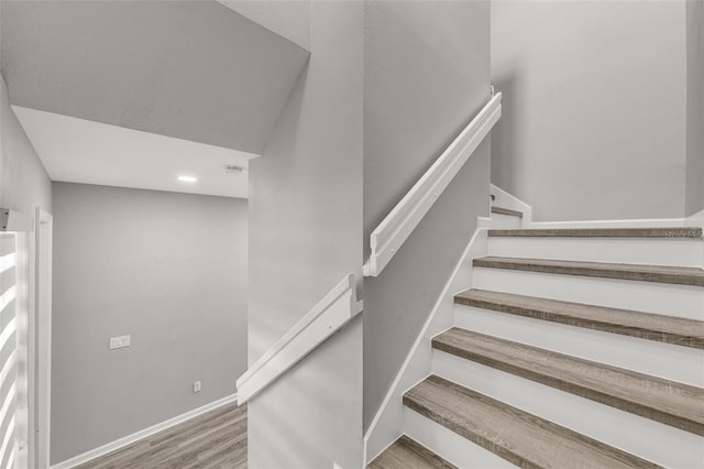 1628 Portofino Meadows Blvd, Orlando, FL 32824 - stairway with wood finished floors and baseboards