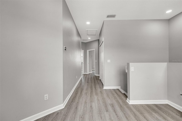 1628 Portofino Meadows Blvd, Orlando, FL 32824 - hallway featuring wood finished floors, baseboards, and recessed lighting