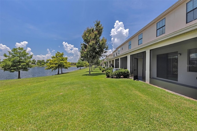 1628 Portofino Meadows Blvd, Orlando, FL 32824 - view of green lawn featuring a water view