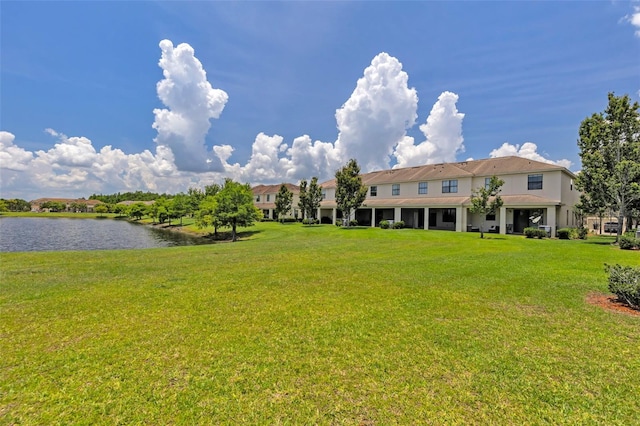 1628 Portofino Meadows Blvd, Orlando, FL 32824 - view of green lawn featuring a water view