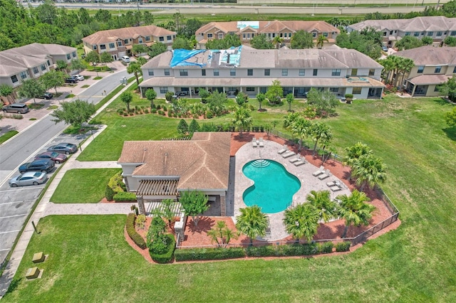 1628 Portofino Meadows Blvd, Orlando, FL 32824 - aerial perspective of suburban area with a pool area