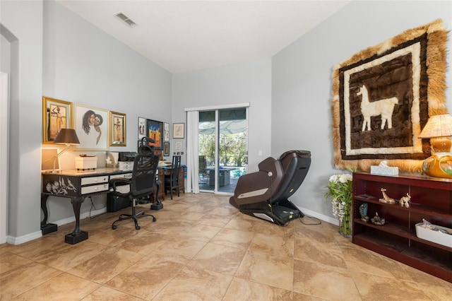 1760 Boat Launch Rd, Kissimmee, FL 34746 - office area featuring a towering ceiling, baseboards, and arched walkways