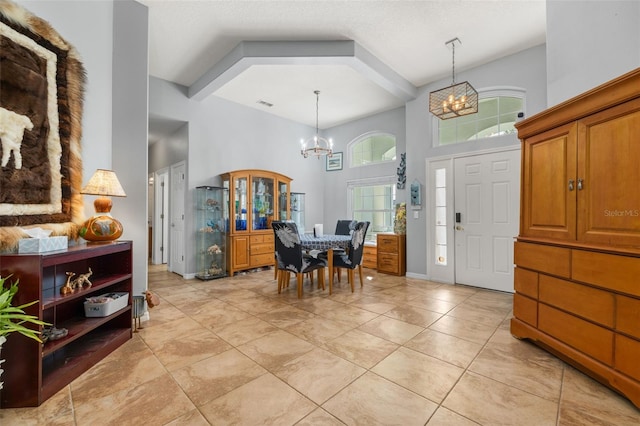 1760 Boat Launch Rd, Kissimmee, FL 34746 - foyer featuring a chandelier, a towering ceiling, and baseboards