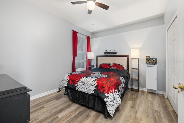 1760 Boat Launch Rd, Kissimmee, FL 34746 - bedroom featuring wood finished floors, baseboards, and a ceiling fan