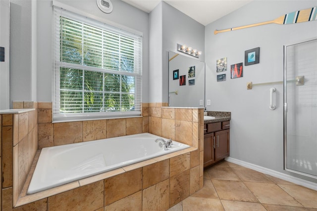 1760 Boat Launch Rd, Kissimmee, FL 34746 - bathroom featuring vanity, plenty of natural light, a garden tub, tile patterned flooring, and lofted ceiling