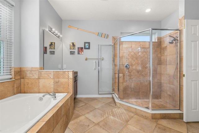 1760 Boat Launch Rd, Kissimmee, FL 34746 - full bath featuring a garden tub, a shower stall, vanity, and baseboards