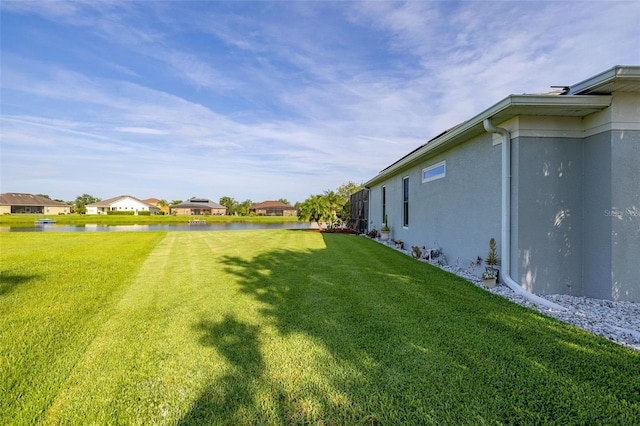 1760 Boat Launch Rd, Kissimmee, FL 34746 - view of green lawn with a water view and a residential view