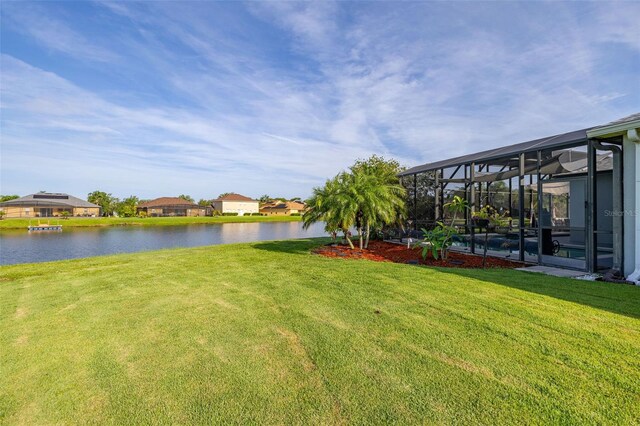 1760 Boat Launch Rd, Kissimmee, FL 34746 - view of grassy yard featuring a water view and glass enclosure