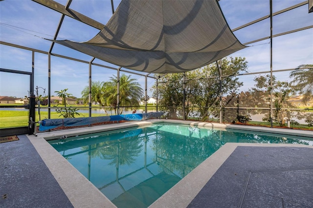 1760 Boat Launch Rd, Kissimmee, FL 34746 - swimming pool featuring glass enclosure, a patio, and a water view