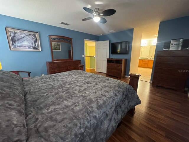 315 Wildflower Rd, Davenport, FL 33837 - bedroom featuring wood finished floors and a ceiling fan