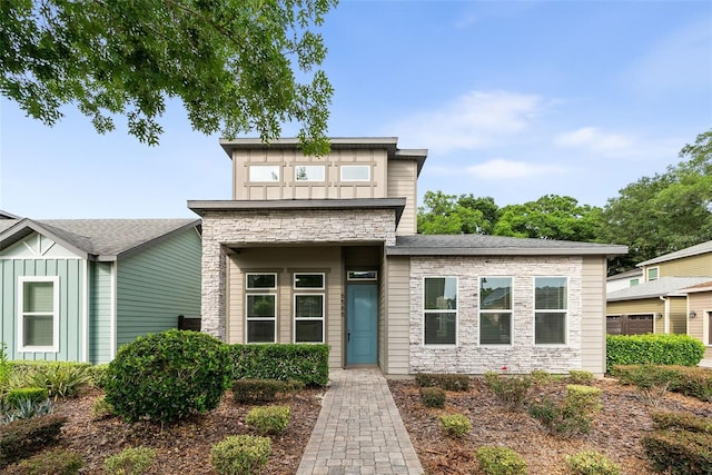 6565 SW 74th Rd, Gainesville, FL 32608 - view of front facade featuring stone siding and board and batten siding