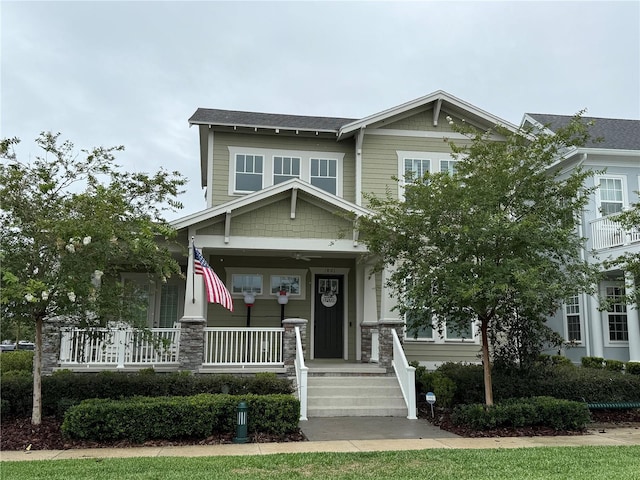 1801 Coastal Ct, Celebration, FL 34747 - craftsman-style house featuring a porch