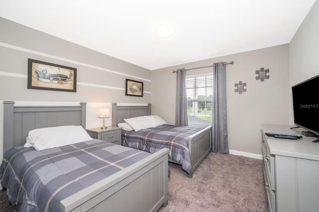 4903 Windermere Ave, Kissimmee, FL 34746 - bedroom with light carpet and baseboards