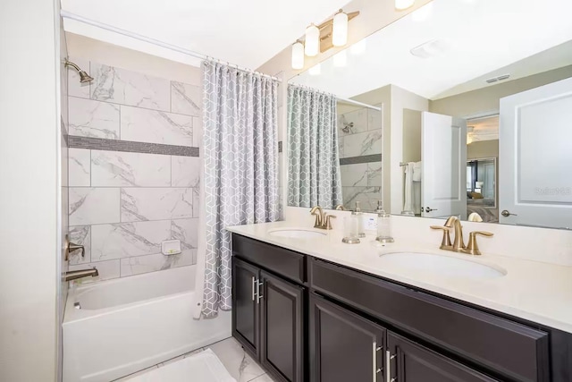 4903 Windermere Ave, Kissimmee, FL 34746 - bathroom with shower / bathtub combination with curtain and double vanity