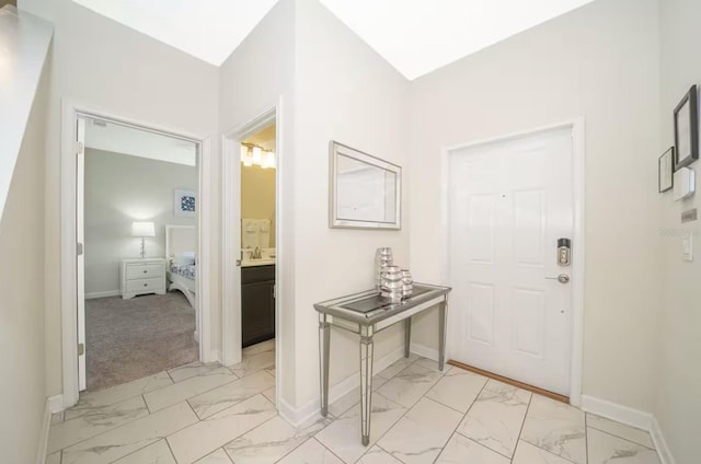 4903 Windermere Ave, Kissimmee, FL 34746 - foyer entrance featuring light marble finish floors and baseboards