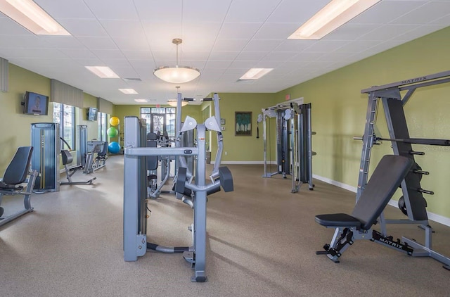 4903 Windermere Ave, Kissimmee, FL 34746 - gym featuring baseboards and a drop ceiling