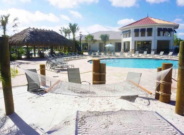 4903 Windermere Ave, Kissimmee, FL 34746 - community pool with a gazebo and a patio area