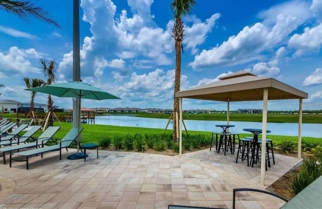 4903 Windermere Ave, Kissimmee, FL 34746 - view of patio featuring a water view and a gazebo