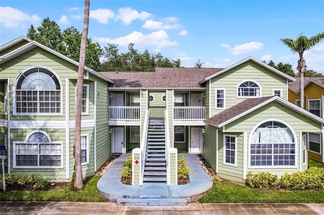 3151 Britannia Blvd Unit C, Kissimmee, FL 34747 - view of front of home with stairs and roof with shingles