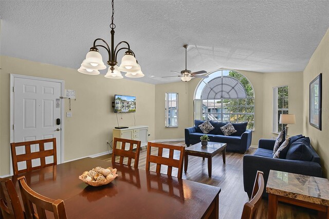 3151 Britannia Blvd Unit C, Kissimmee, FL 34747 - dining space with wood finished floors, plenty of natural light, ceiling fan, a textured ceiling, and a chandelier