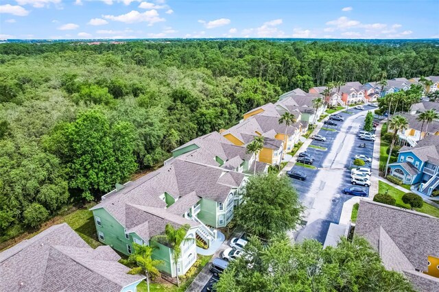 3151 Britannia Blvd Unit C, Kissimmee, FL 34747 - aerial perspective of suburban area featuring a forest