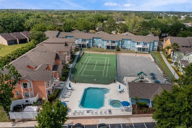 3151 Britannia Blvd Unit C, Kissimmee, FL 34747 - aerial perspective of suburban area with a pool area