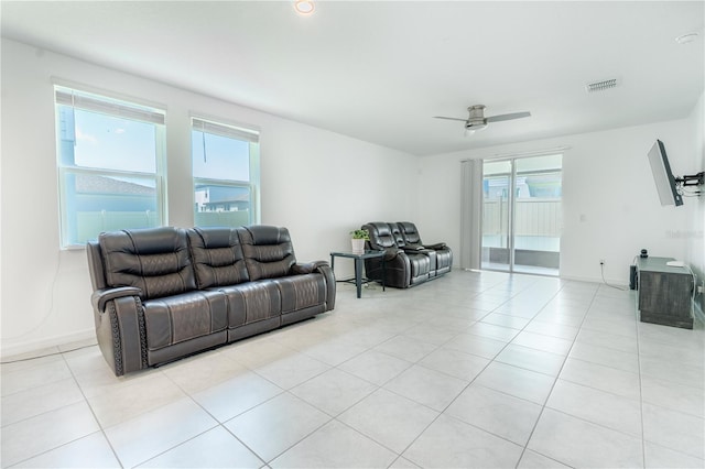 3442 Monaco Ln, Davenport, FL 33897 - living area featuring ceiling fan and light tile patterned flooring