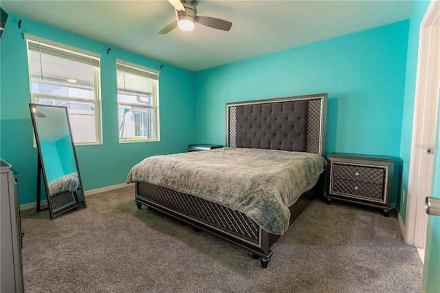 3442 Monaco Ln, Davenport, FL 33897 - carpeted bedroom featuring baseboards and ceiling fan
