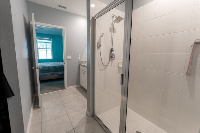 3442 Monaco Ln, Davenport, FL 33897 - full bath with a shower stall, tile patterned flooring, vanity, and ensuite bathroom