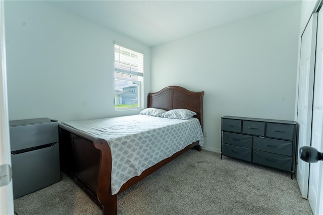 3442 Monaco Ln, Davenport, FL 33897 - carpeted bedroom featuring freestanding refrigerator