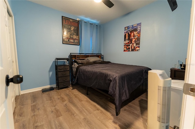 3442 Monaco Ln, Davenport, FL 33897 - bedroom featuring wood finished floors and a ceiling fan