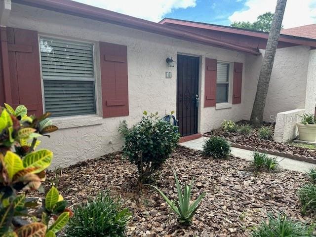 13 W Marbrisa Way, Kissimmee, FL 34743 - property entrance with stucco siding