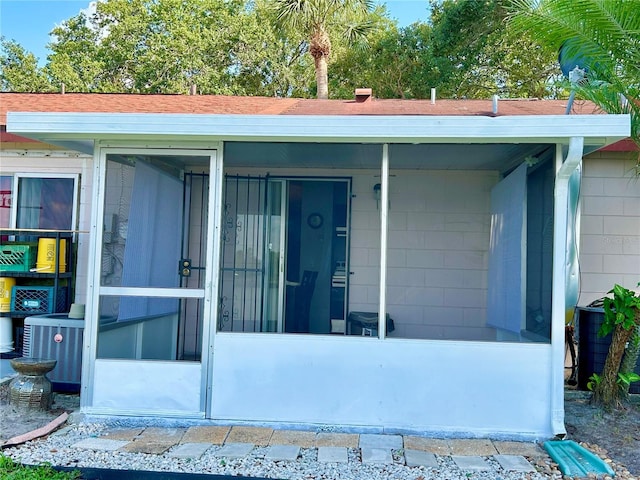13 W Marbrisa Way, Kissimmee, FL 34743 - view of exterior entry featuring central AC unit