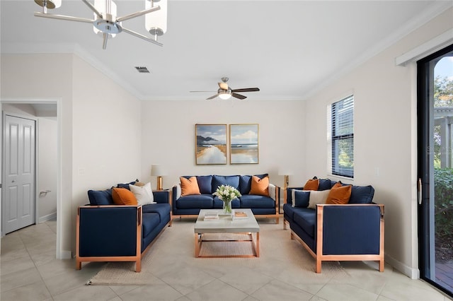 1312 Royal St George Blvd, Davenport, FL 33896 - living area featuring a ceiling fan, healthy amount of natural light, crown molding, baseboards, and light tile patterned flooring