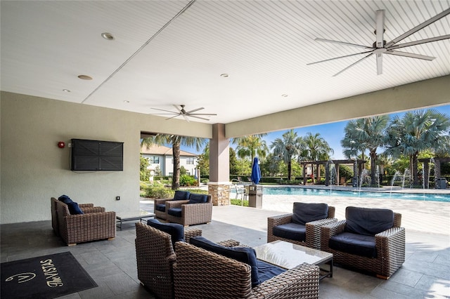 1312 Royal St George Blvd, Davenport, FL 33896 - view of patio / terrace with ceiling fan, an outdoor living space, and an outdoor pool