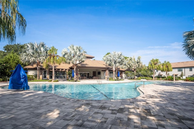 1312 Royal St George Blvd, Davenport, FL 33896 - community pool featuring a patio area