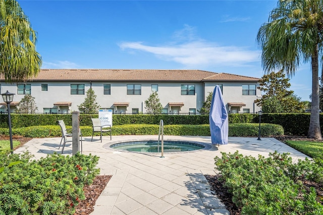 1312 Royal St George Blvd, Davenport, FL 33896 - view of pool with a hot tub and a patio area