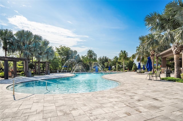 1312 Royal St George Blvd, Davenport, FL 33896 - community pool with a patio