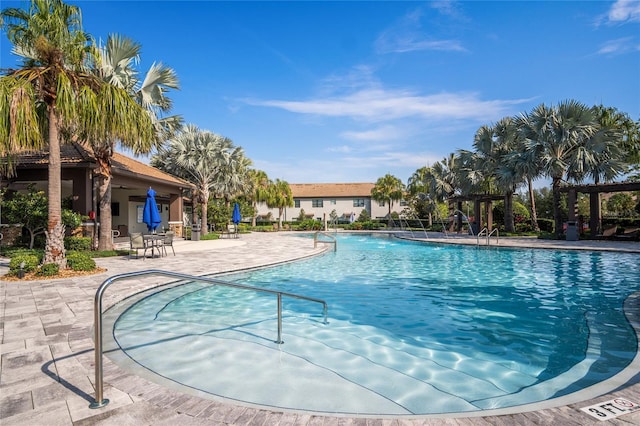 1312 Royal St George Blvd, Davenport, FL 33896 - community pool featuring a patio and a pergola