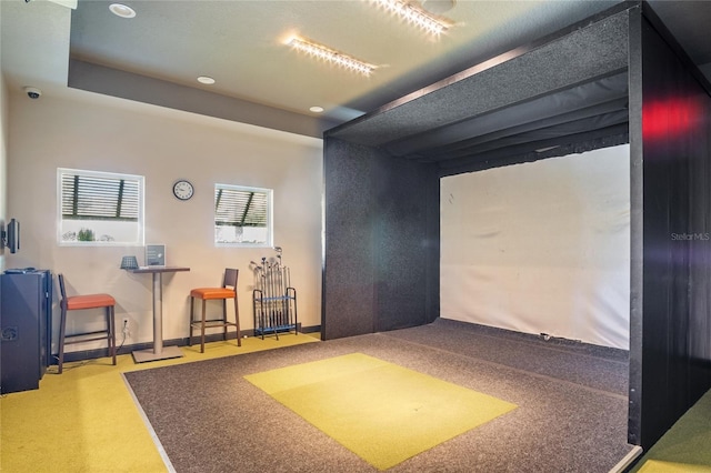 1312 Royal St George Blvd, Davenport, FL 33896 - recreation room with golf simulator, carpet floors, recessed lighting, and baseboards