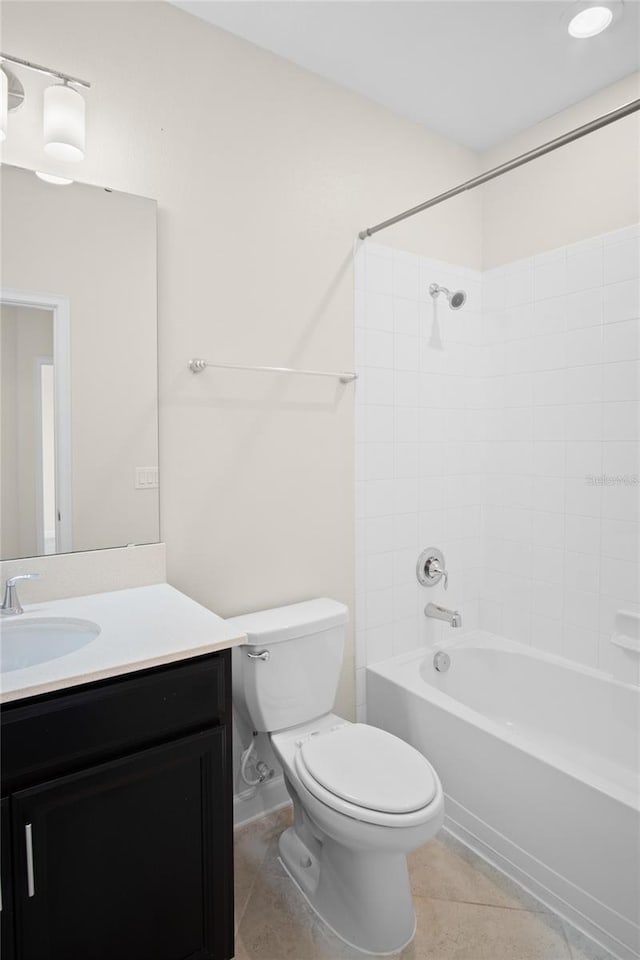 1312 Royal St George Blvd, Davenport, FL 33896 - bathroom with toilet, vanity, washtub / shower combination, and tile patterned flooring