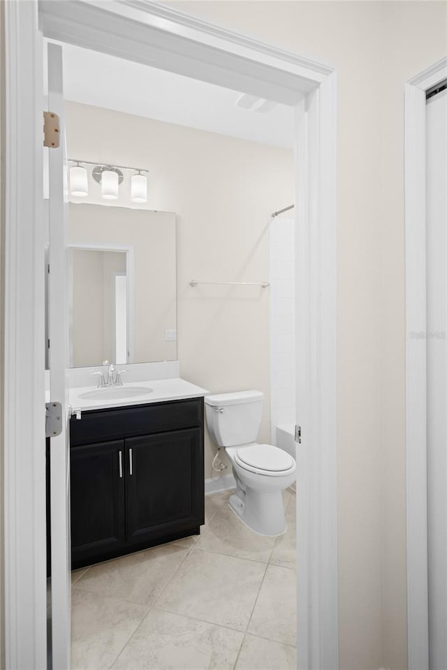 1312 Royal St George Blvd, Davenport, FL 33896 - bathroom with vanity, toilet, and tile patterned flooring
