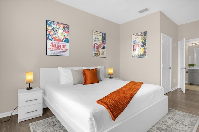 2307 Silver Palm Dr Unit 304, Kissimmee, FL 34747 - bedroom featuring wood finished floors and baseboards