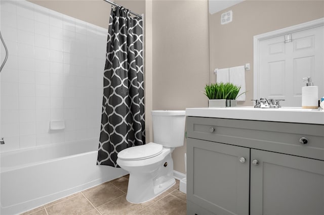 2307 Silver Palm Dr Unit 304, Kissimmee, FL 34747 - full bath with vanity, toilet, tile patterned floors, and shower / bath combination with curtain