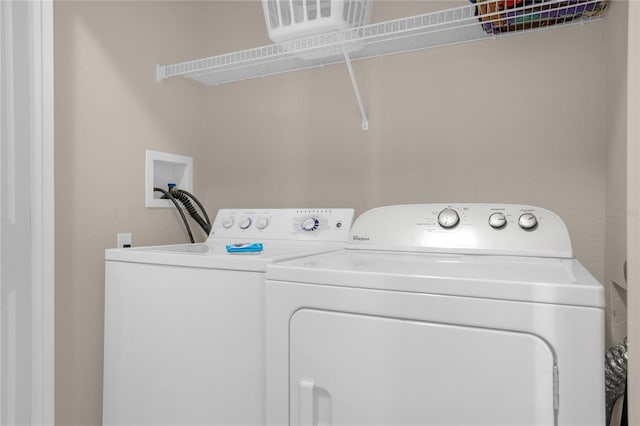 2307 Silver Palm Dr Unit 304, Kissimmee, FL 34747 - laundry area with washer and clothes dryer