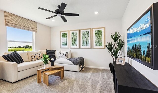 762 Lake Dell Ave, Dundee, FL 33838 - living room with light colored carpet, baseboards, recessed lighting, and a ceiling fan