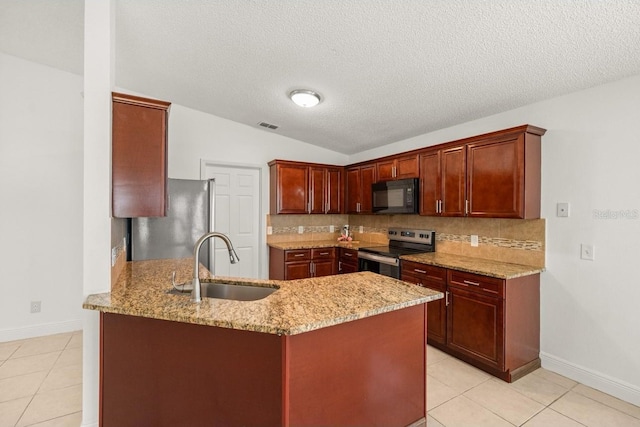 1914 Ellery Ln, Kissimmee, FL 34746 - kitchen with appliances with stainless steel finishes, a sink, a peninsula, light stone counters, and light tile patterned flooring